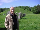 John Kraft in front of the burial mound